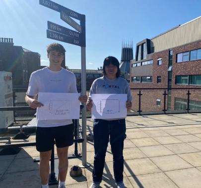 Sam and Lennox showing their results