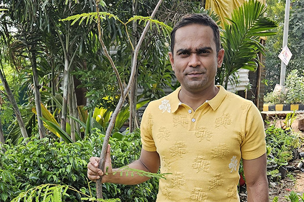 A person posing for a photo.