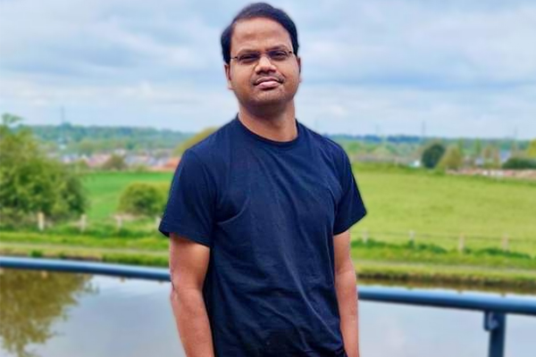 A person posing for a photo.