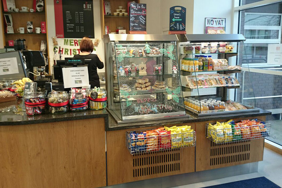 Cafe counter displaying snacks, crisps and cakes in the Life Sciences cafe