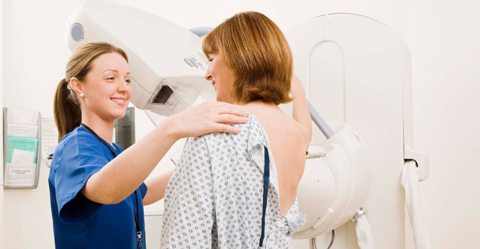 woman having a mammogram