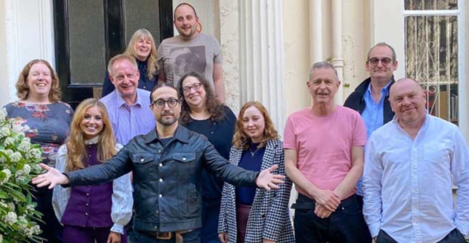 Holly and other colleagues with Sean Lennon
