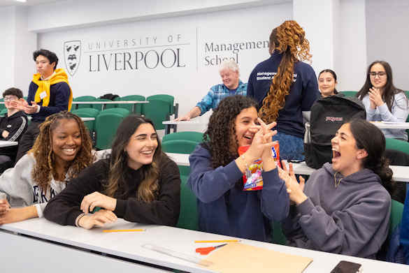 students celebrate winning business game