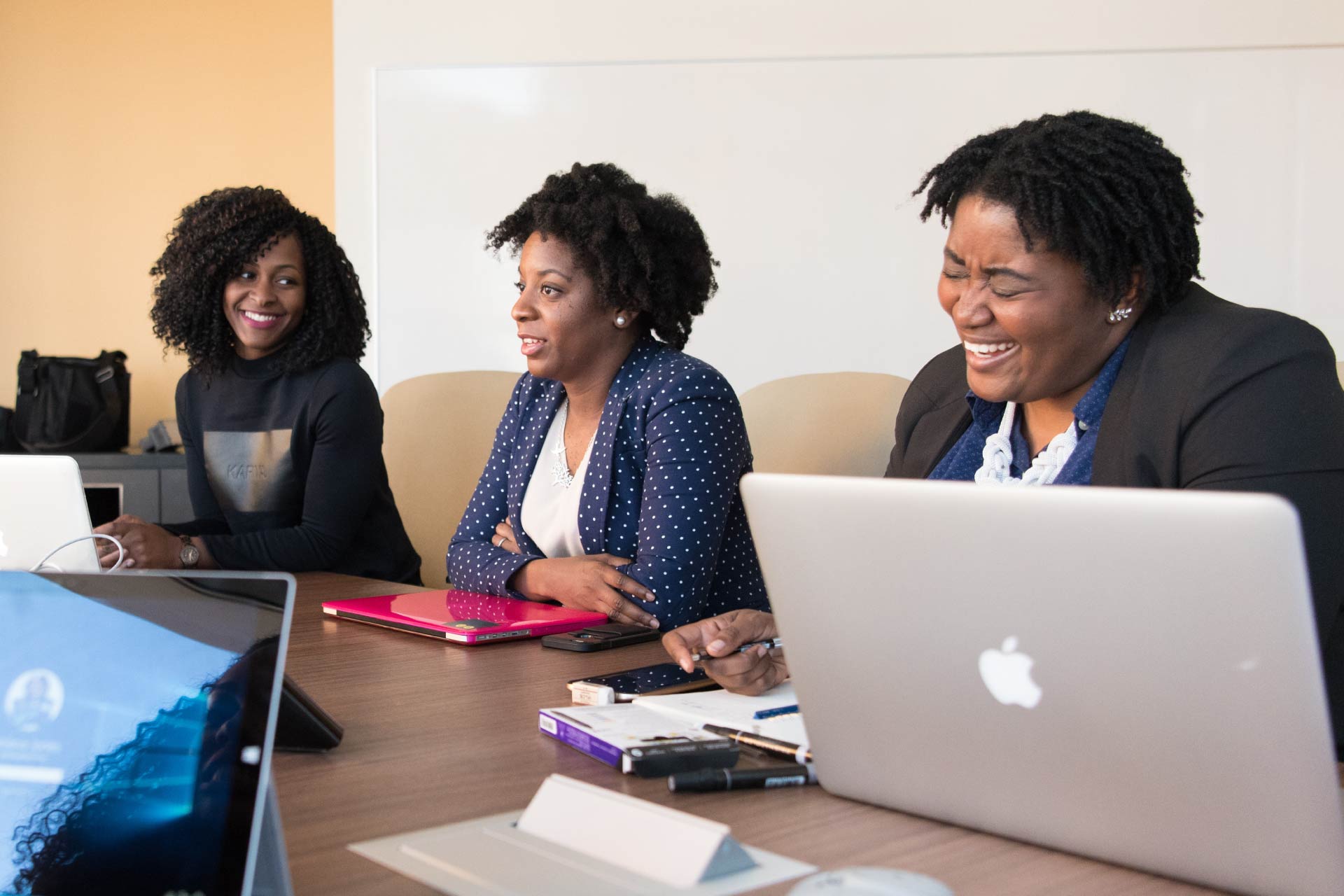 Team of black females having a business meeting