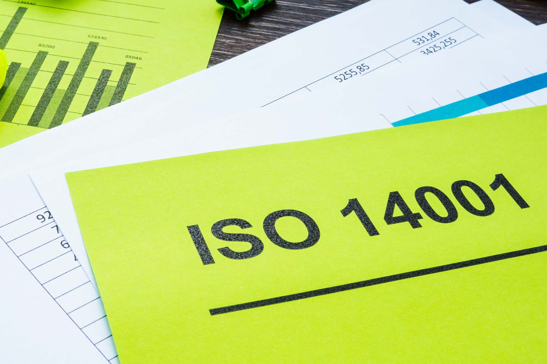 ISO 14001 documents on table