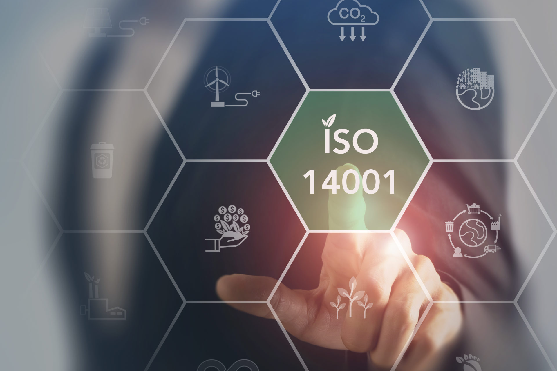 Concept image - ISO 14001 hexagonal cells ads male pointing with his finger