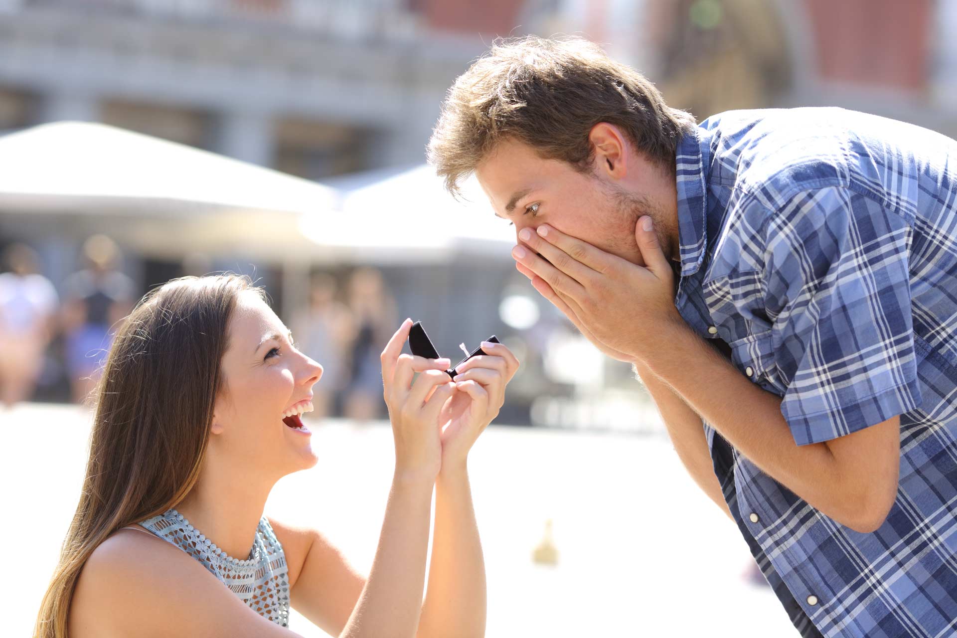 Image of woman proposing her male partner