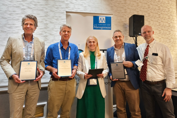 Julia Balogun receiving the 2024 Organization and Management Theory (OMT) Division Joanne Martin Trailblazer Award at AOM 2024