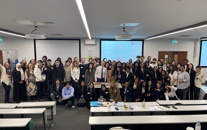 MSc Human Resources students smiling for picture at a Consultancy Day
