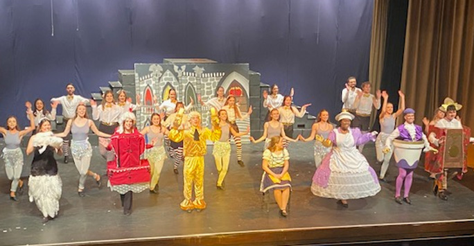 The cast of Beauty and the Beast on stage