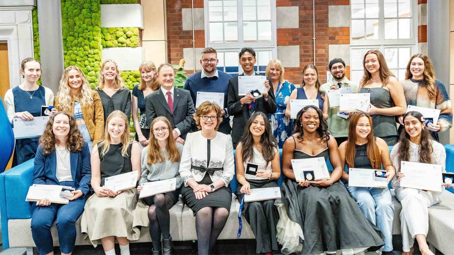 All the prize winners with Ian Young and Hazel Scott in the Student Hub at Cedar House