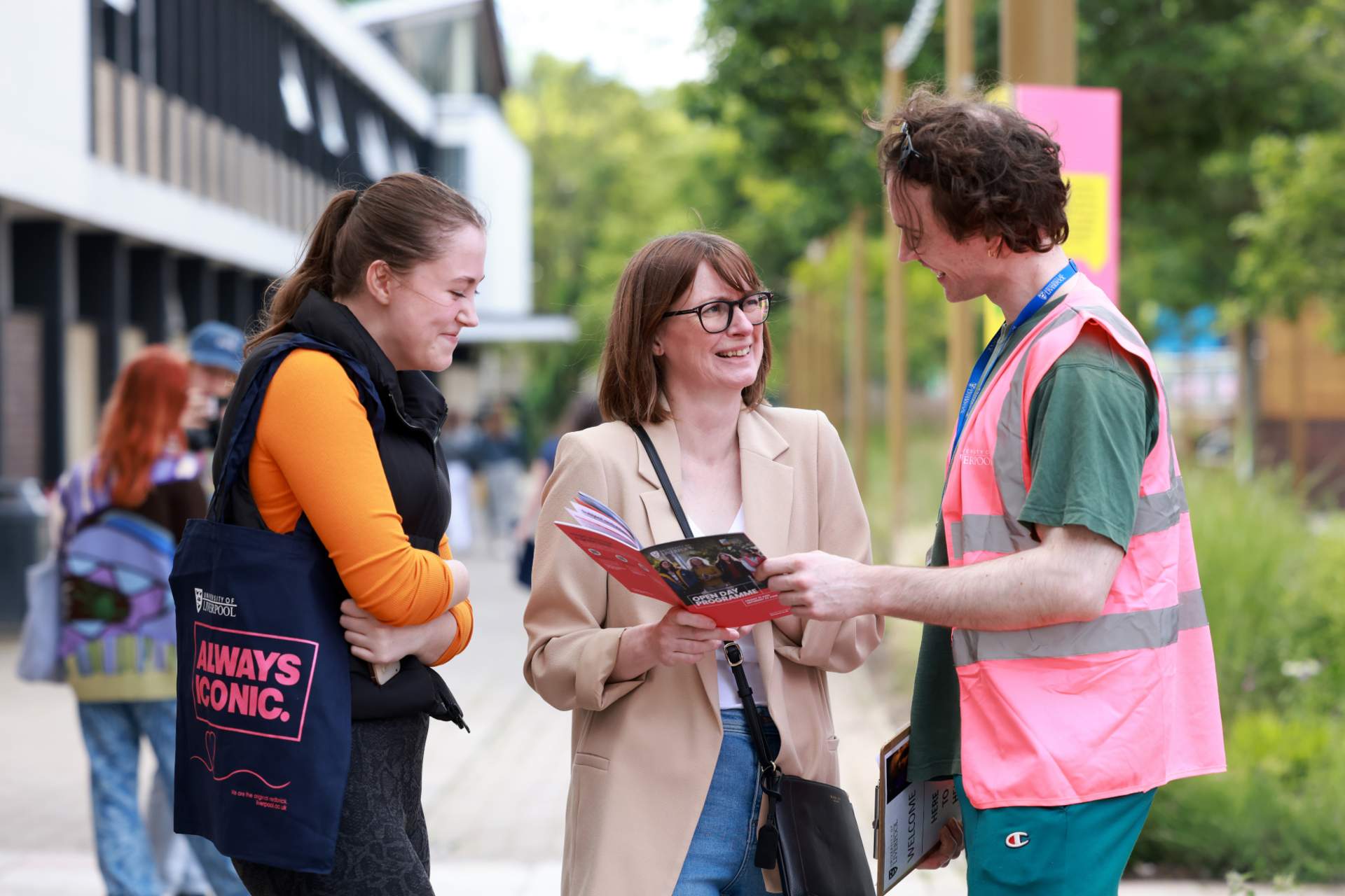 Open Day visitors talking to a member of staff.