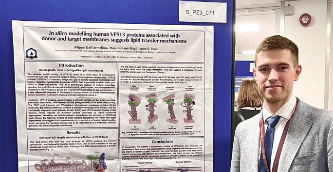 Filippo Dall'Armellina presenting his poster at a neuroscience conference