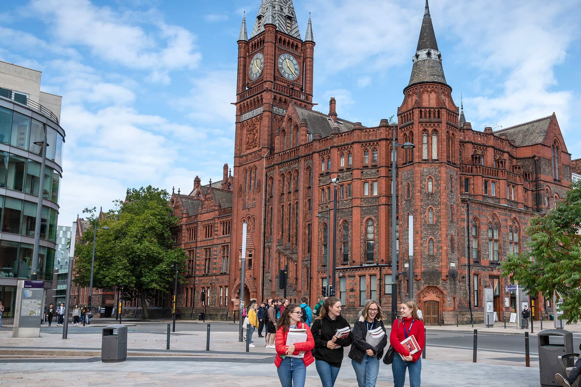 Victoria building in background with students walking on campus