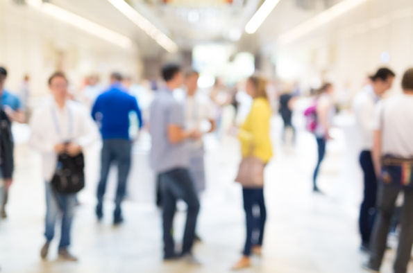 Blurred photograph of people networking