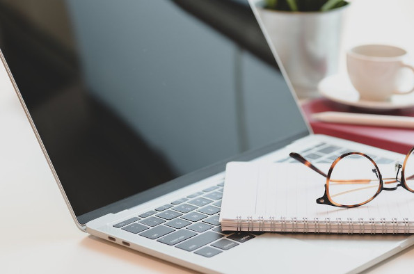 Brown Framed Eyeglasses on White Notebook (Photo by bongkarn thanyakij from Pexels)