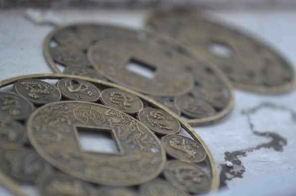 traditional Chinese coins depicting Chinese zodiac