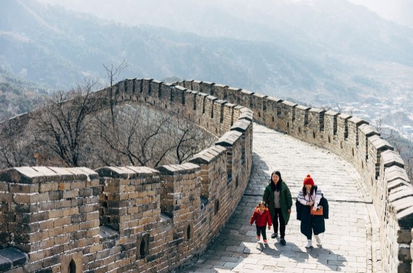 family walking along Great Wall of China