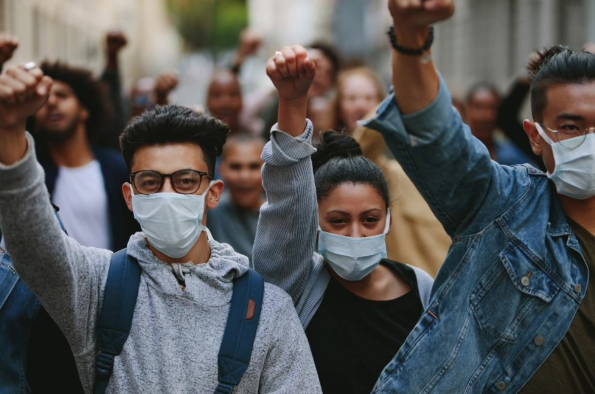 Protesters wearing masks