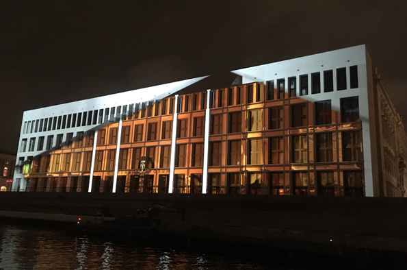 Modern building next to body of water