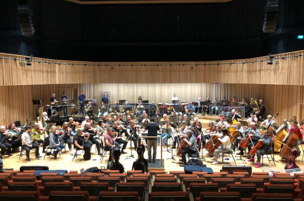 Image of the Orchestra performing 